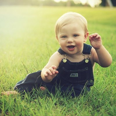 toddler in grass