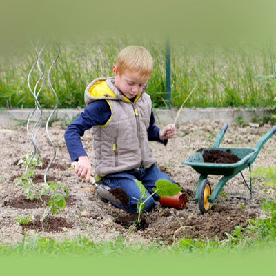 Elementary-age-in-a-garden