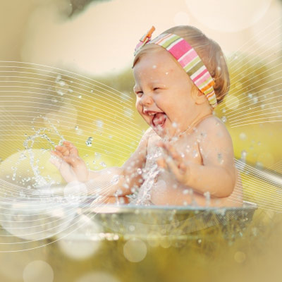 1-year-old-playing-with-dish-of-water
